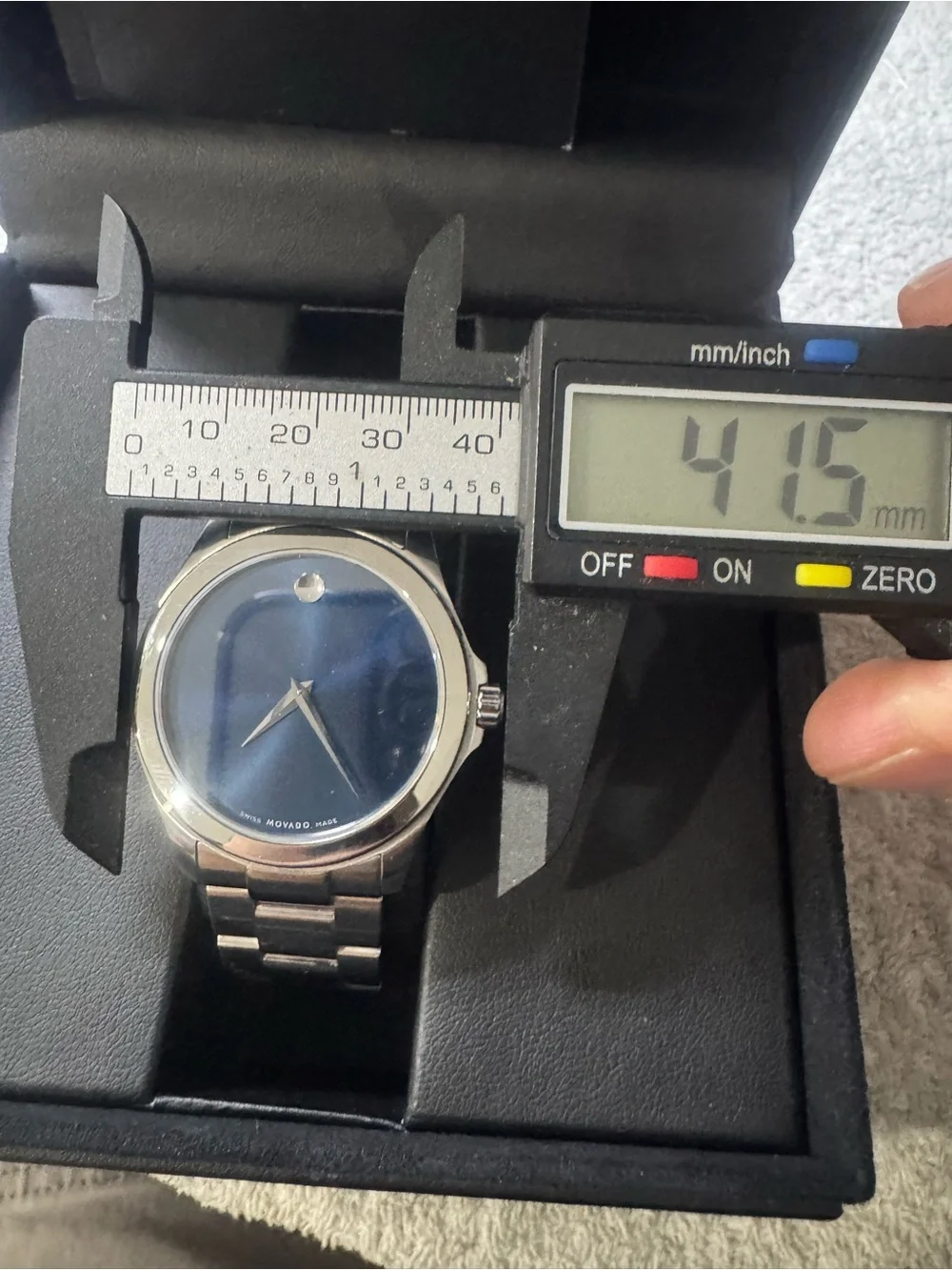 #184 Movado Men's Silver Watch with Blue Sunburst Dial